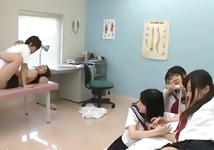 Doctor examining and sex with students in school