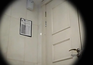 Sexy spycam redhead in bathroom