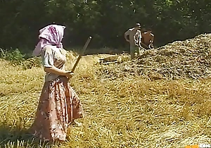 Two Farmers and One Simmering Babe Bang Their Fuck Holes on the Field