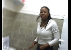 Very many ghetto black gals peeing on WC
